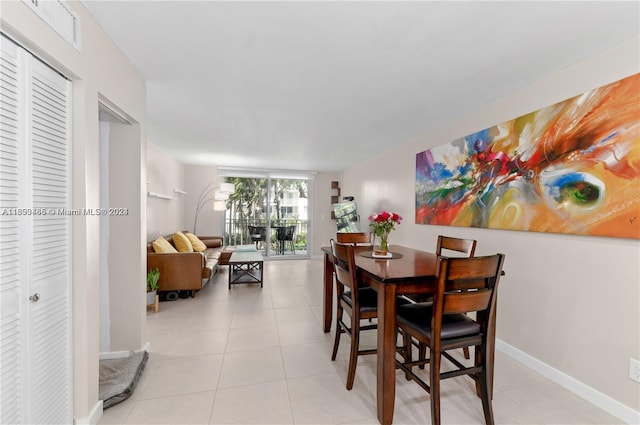 dining room featuring light tile patterned floors