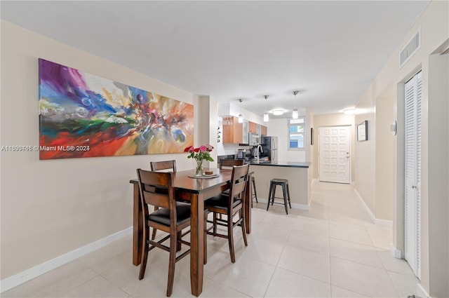 view of tiled dining area