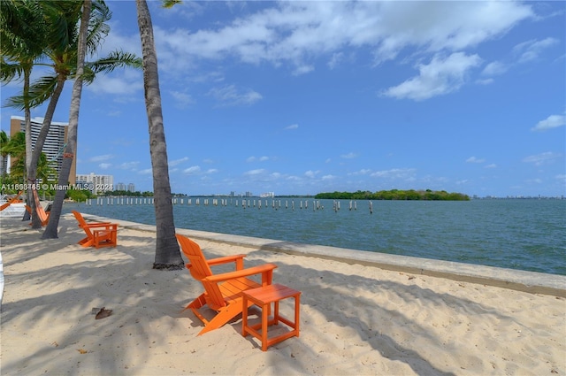 property view of water featuring a beach view