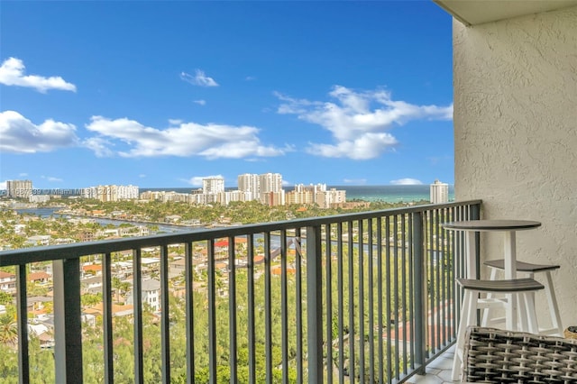 balcony featuring a water view