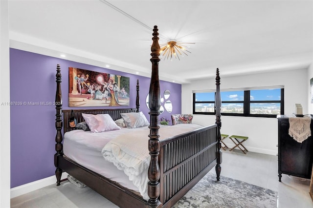 bedroom featuring an inviting chandelier