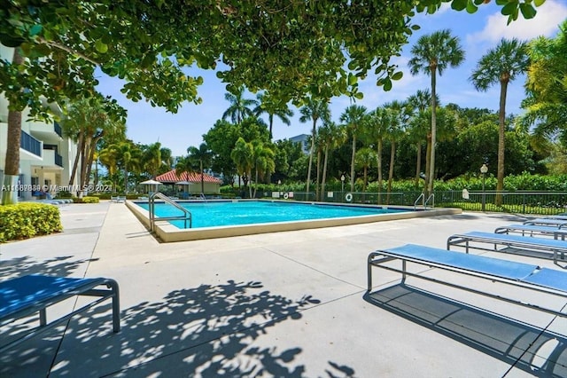 view of swimming pool featuring a patio area