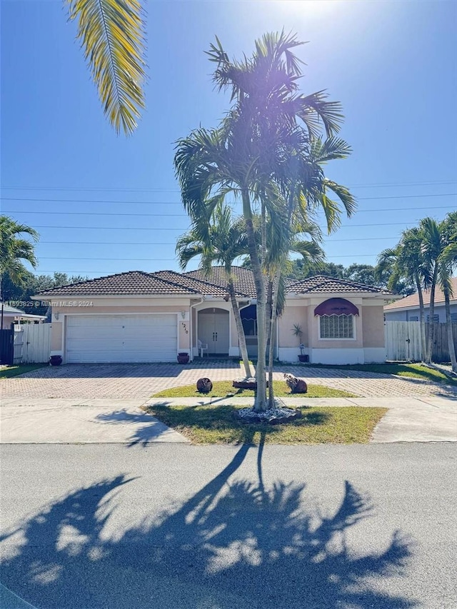 view of front of home with a garage