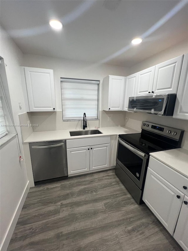 kitchen featuring white cabinets, sink, and stainless steel appliances