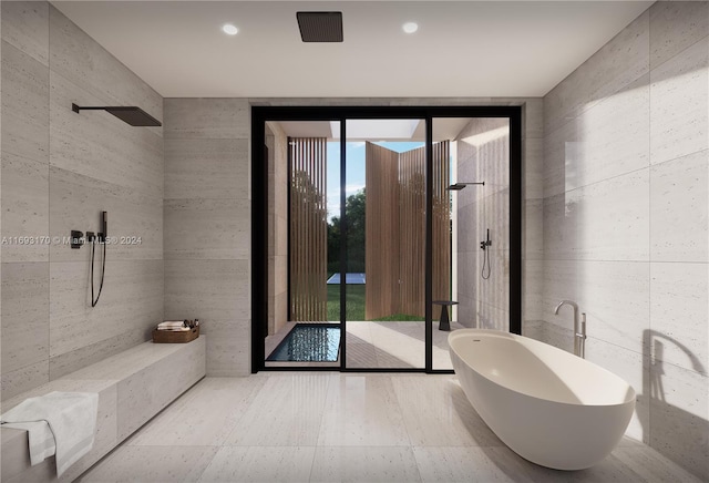 bathroom featuring tile walls and independent shower and bath