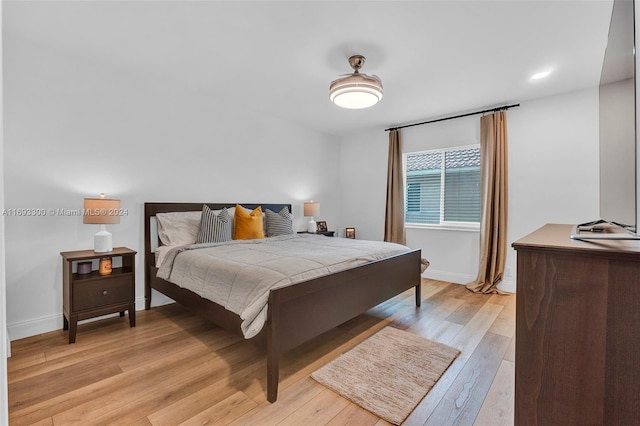 bedroom featuring light hardwood / wood-style floors