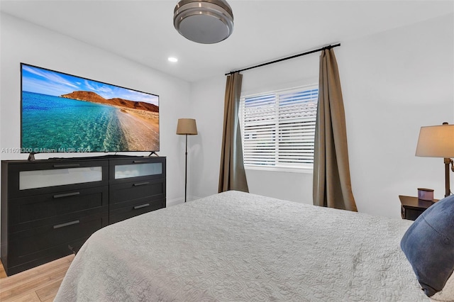 bedroom with light hardwood / wood-style floors