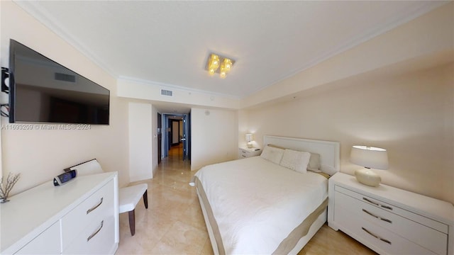 tiled bedroom with ornamental molding