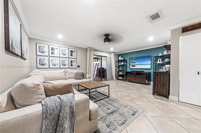 living room featuring light tile patterned floors, ceiling fan, and crown molding