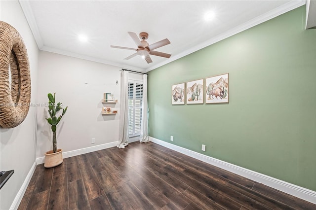 unfurnished room with dark hardwood / wood-style floors, ceiling fan, and crown molding