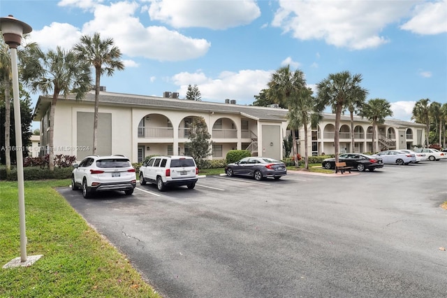 2703 Nassau Bnd Unit C2, Coconut Creek, FL 33066 - view of property featuring uncovered parking