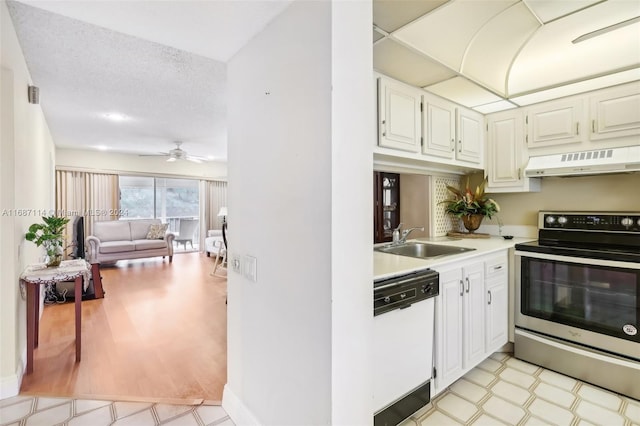 kitchen with white cabinetry, stainless steel electric range oven, sink, ventilation hood, and white dishwasher