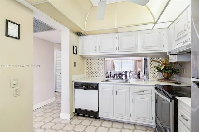 2703 Nassau Bnd Unit C2, Coconut Creek, FL 33066 - kitchen featuring white dishwasher, stainless steel electric stove, light countertops, under cabinet range hood, and light flooring