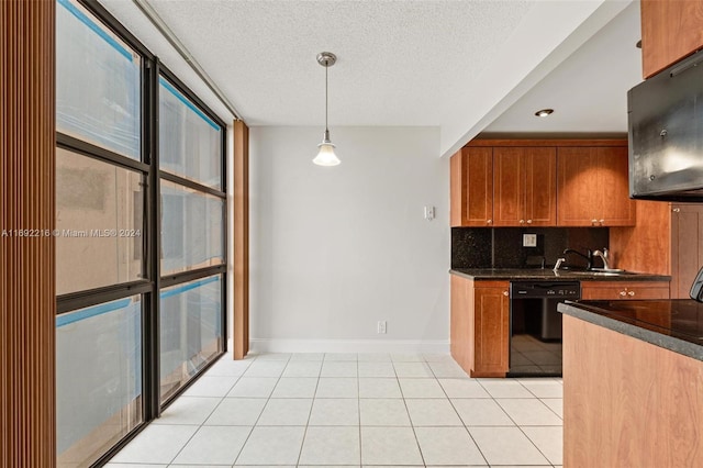 kitchen with decorative light fixtures, black dishwasher, tasteful backsplash, and light tile patterned floors