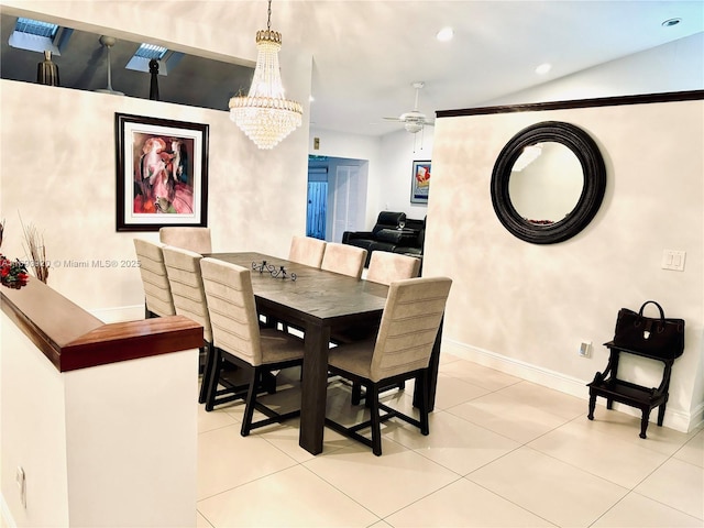 tiled dining room with ceiling fan with notable chandelier