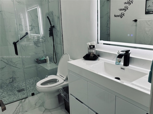 bathroom with vanity, toilet, and an enclosed shower