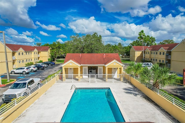 view of swimming pool featuring a patio area