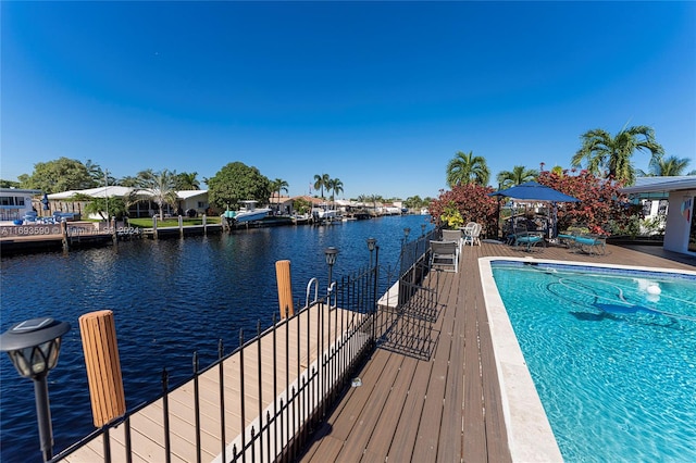 dock area with a water view