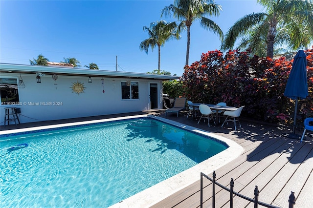 view of pool with a deck