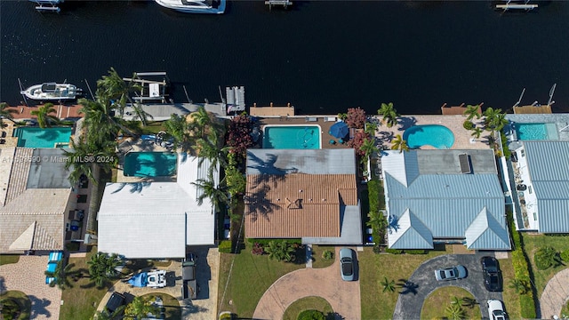 bird's eye view with a water view