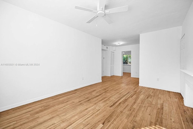 unfurnished room featuring ceiling fan and light hardwood / wood-style flooring