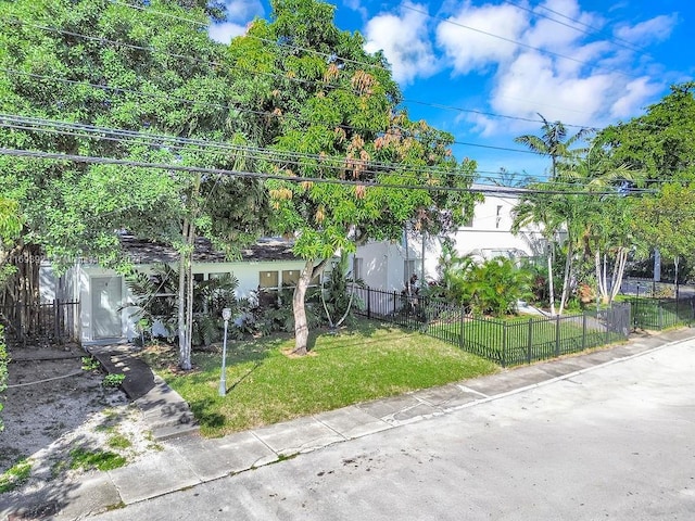 view of property exterior featuring a lawn