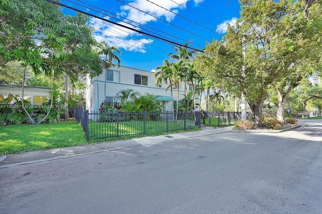 exterior space with a front lawn