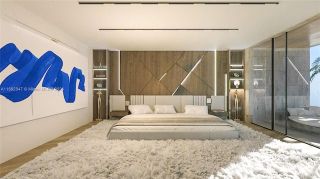 bedroom featuring light hardwood / wood-style flooring