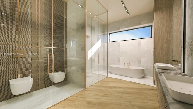 full bathroom featuring tile patterned floors, vanity, plus walk in shower, and tile walls