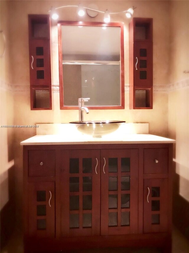 801 Three Islands Blvd Unit 411, Hallandale Beach, FL 33009 - bathroom featuring vanity and a shower with door