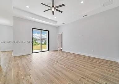 unfurnished room with light hardwood / wood-style flooring and ceiling fan