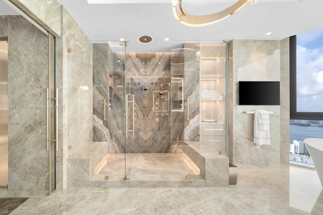 bathroom with floor to ceiling windows and separate shower and tub