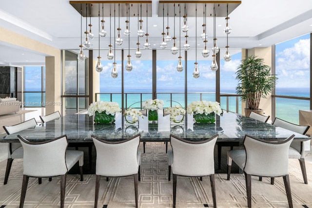 dining area featuring a water view