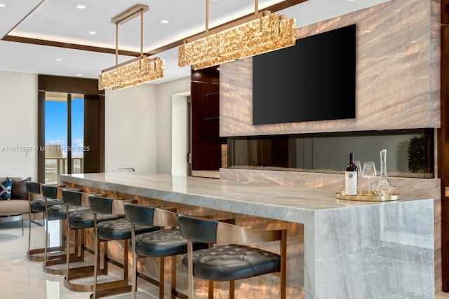 bar featuring pendant lighting