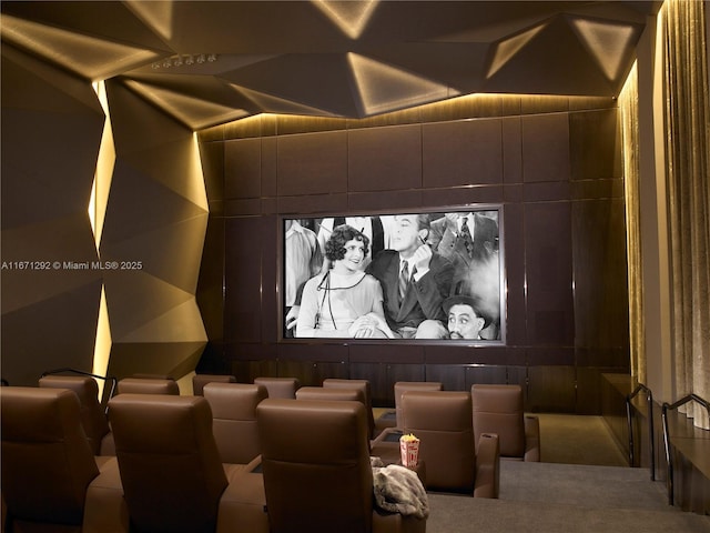 cinema room featuring lofted ceiling