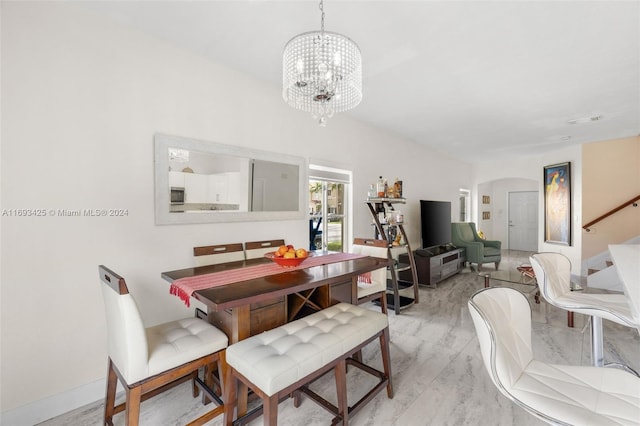 dining area with a chandelier