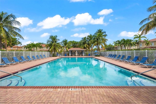 view of swimming pool with a patio