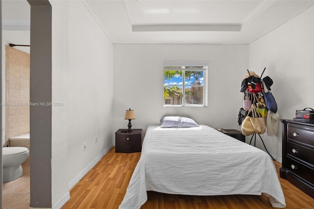 bedroom with light wood-type flooring