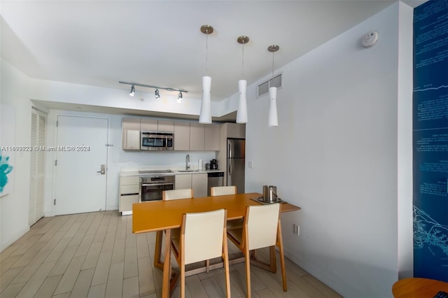 dining area featuring sink