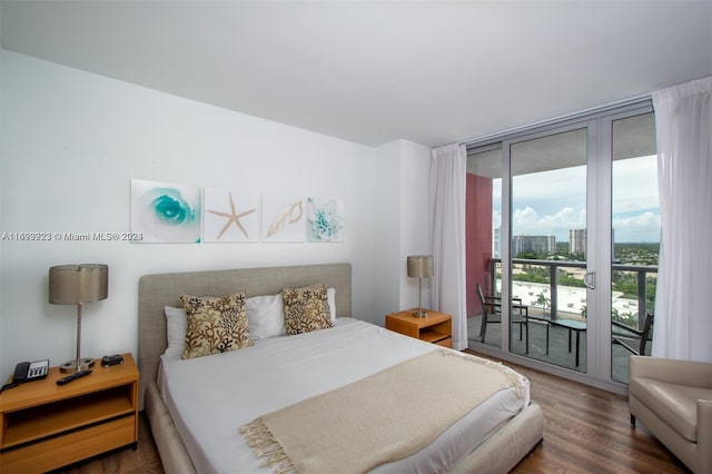 bedroom featuring floor to ceiling windows, access to exterior, and dark wood-type flooring