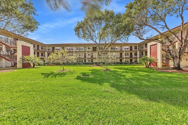 view of community featuring a lawn