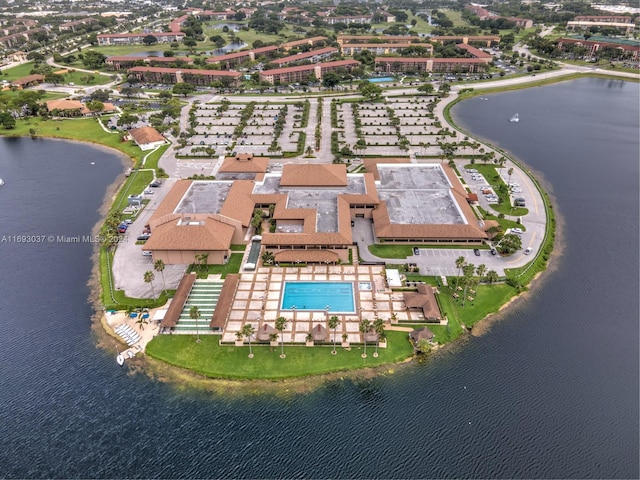 birds eye view of property featuring a water view