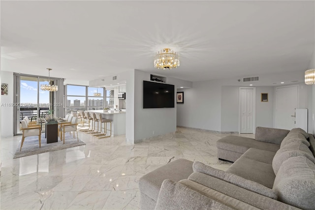 living room featuring a chandelier