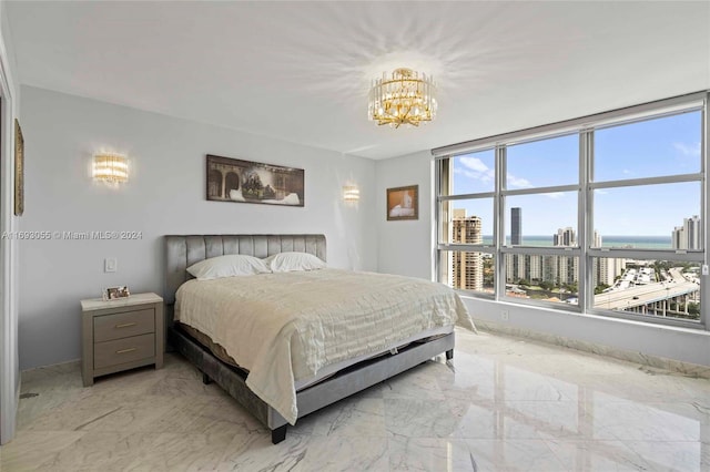 bedroom with a chandelier