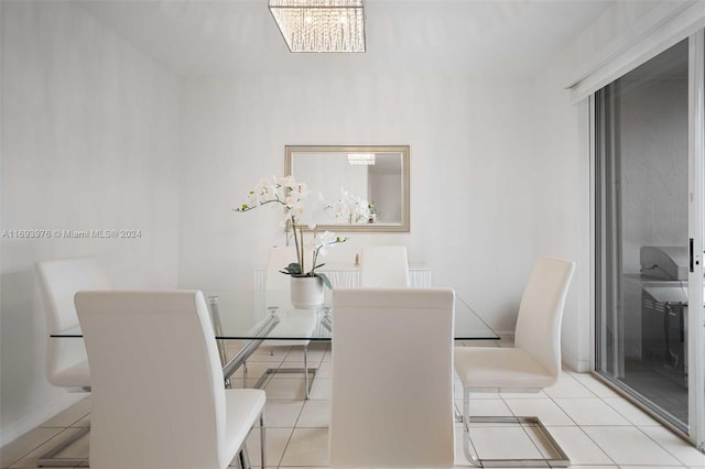 dining space with light tile patterned floors