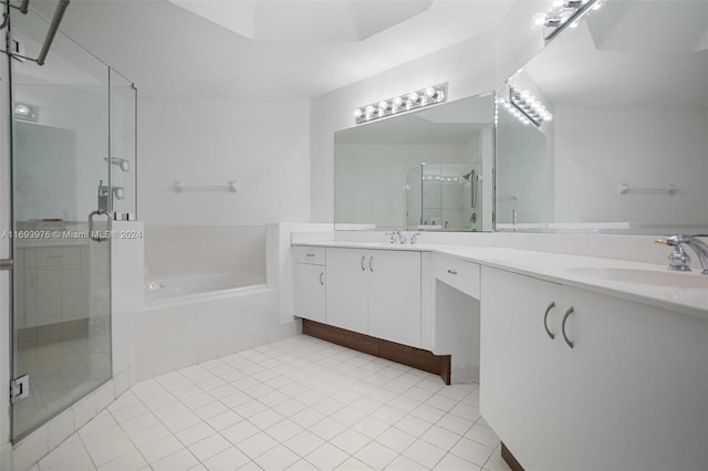 bathroom featuring tile patterned floors, vanity, and plus walk in shower