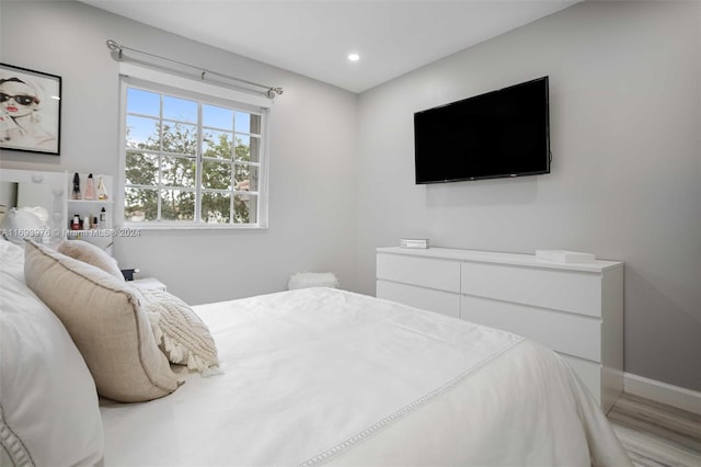 bedroom featuring light hardwood / wood-style flooring