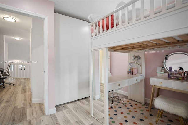 bedroom featuring hardwood / wood-style flooring and wooden ceiling