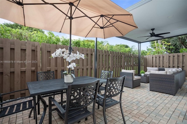 view of patio / terrace featuring outdoor lounge area and ceiling fan