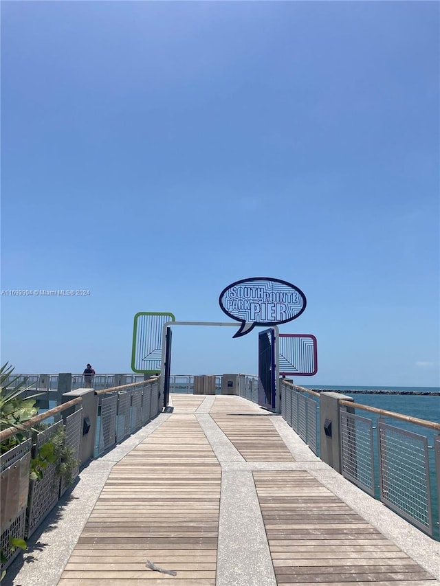 view of basketball court featuring a water view